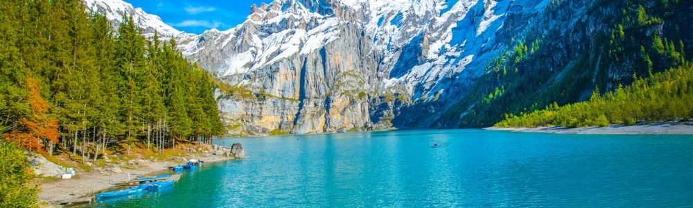 Amazing,Tourquise,Oeschinnensee,With,Waterfalls,And,Swiss,Alps,,Kandersteg,,Berner